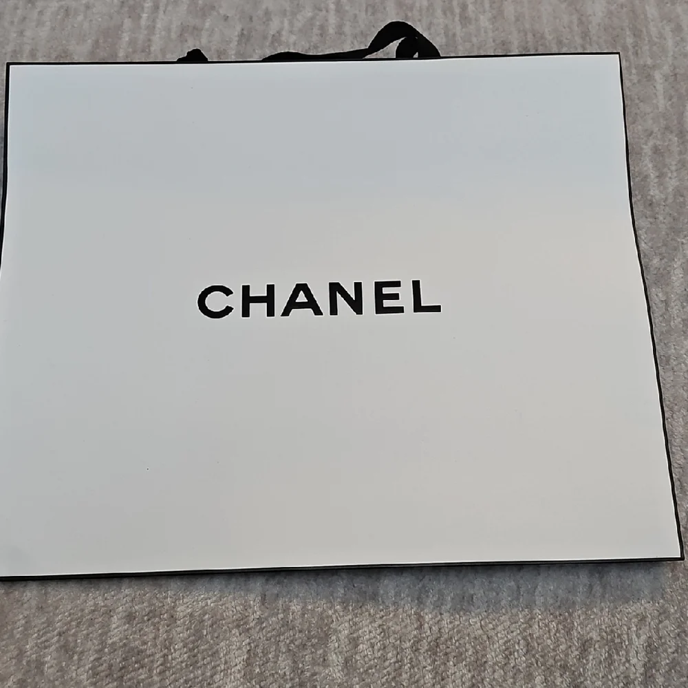 Chanel White Bag with Black Accents